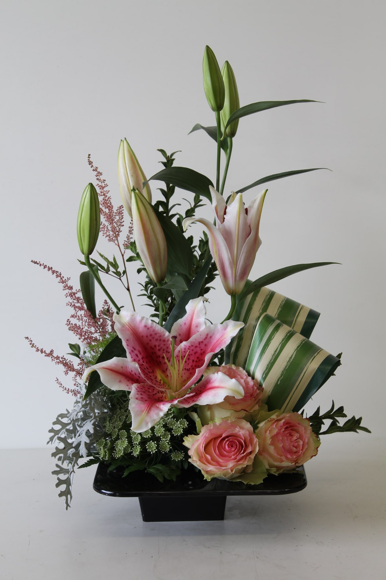 Lilies arrangements — hand-composed in the Huntington Beach atelier