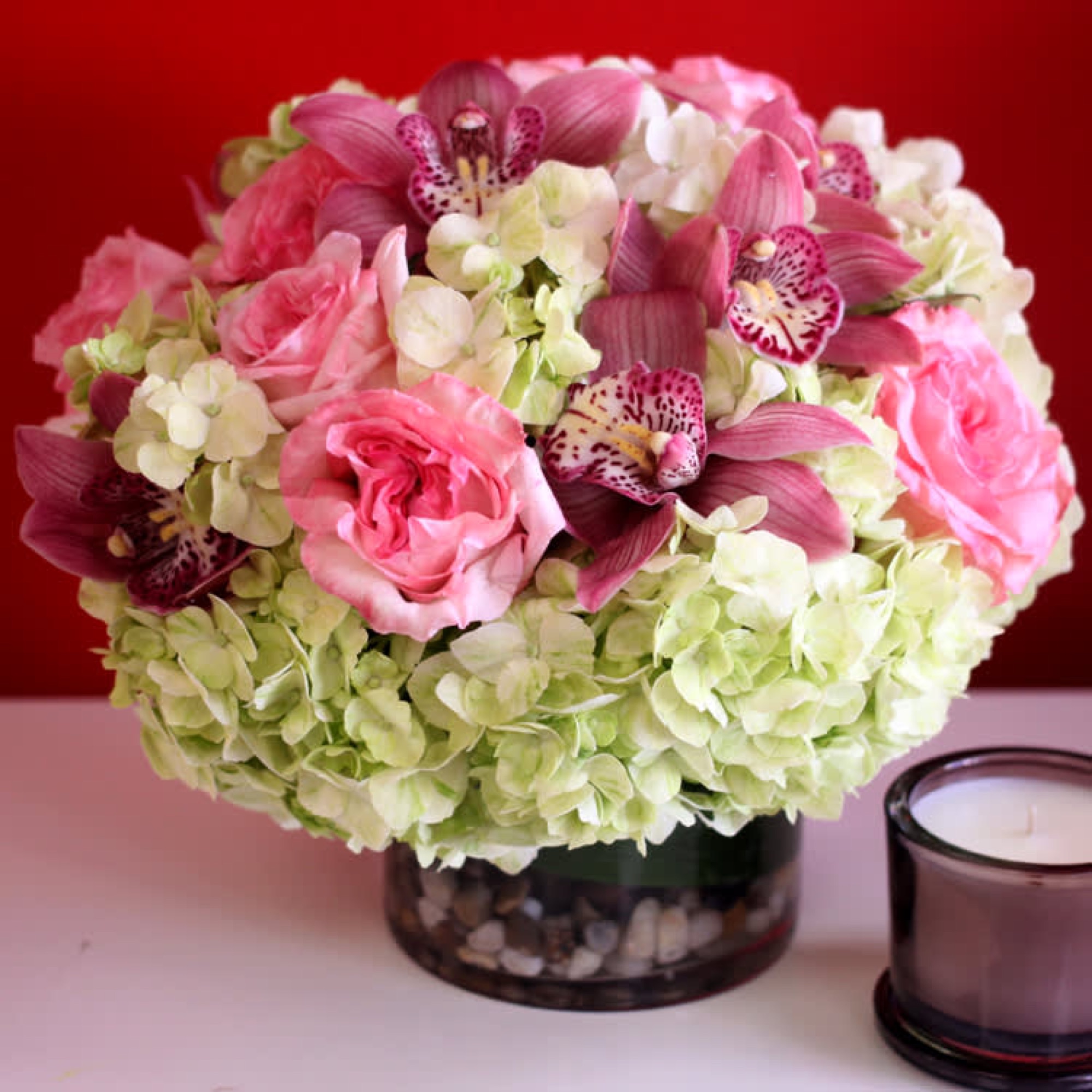 Pink Orchids and Garden Roses in a Vase